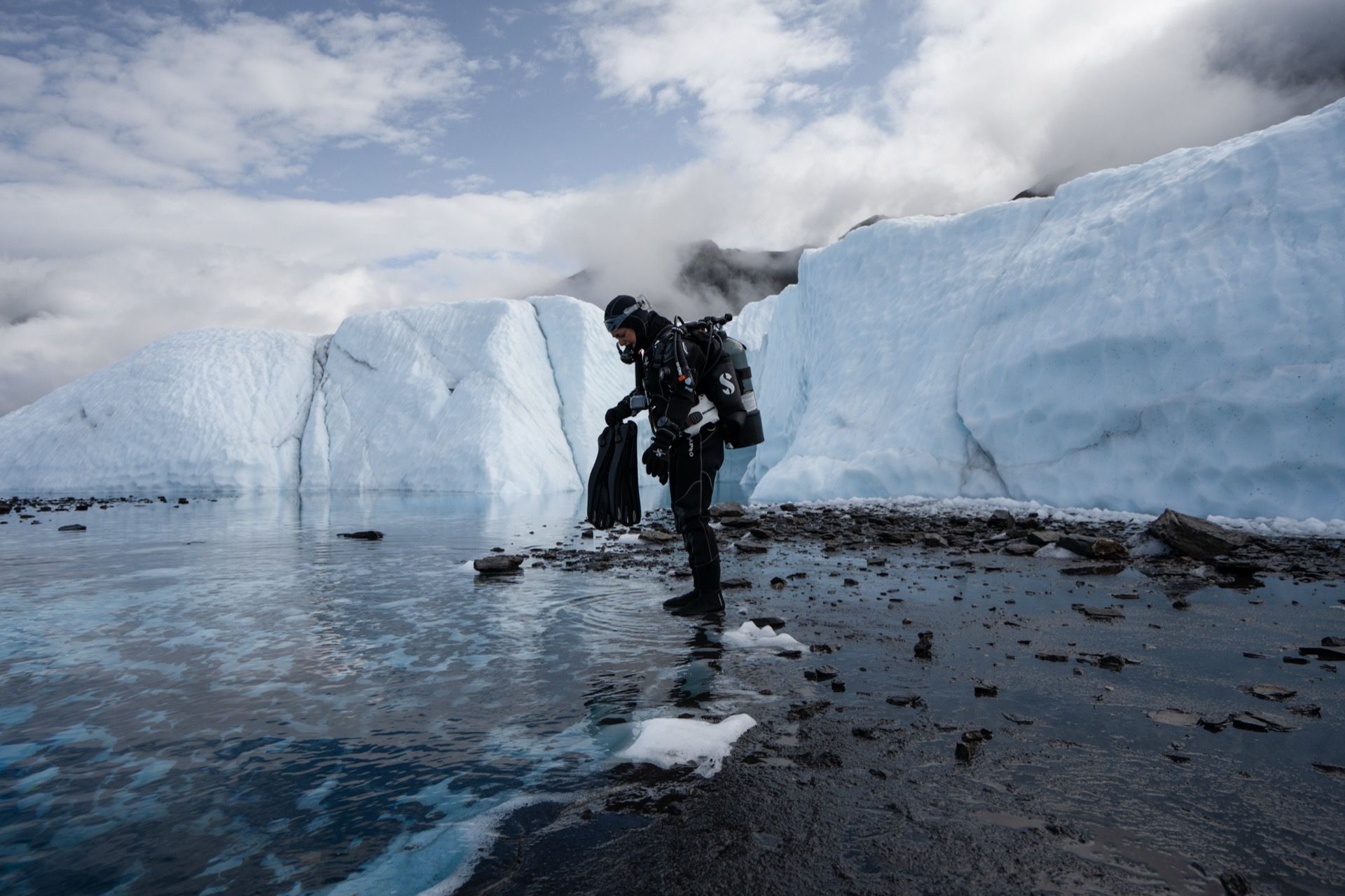 Andi Cross diving in ice waters - SSI Divemaster and ocean explorer
