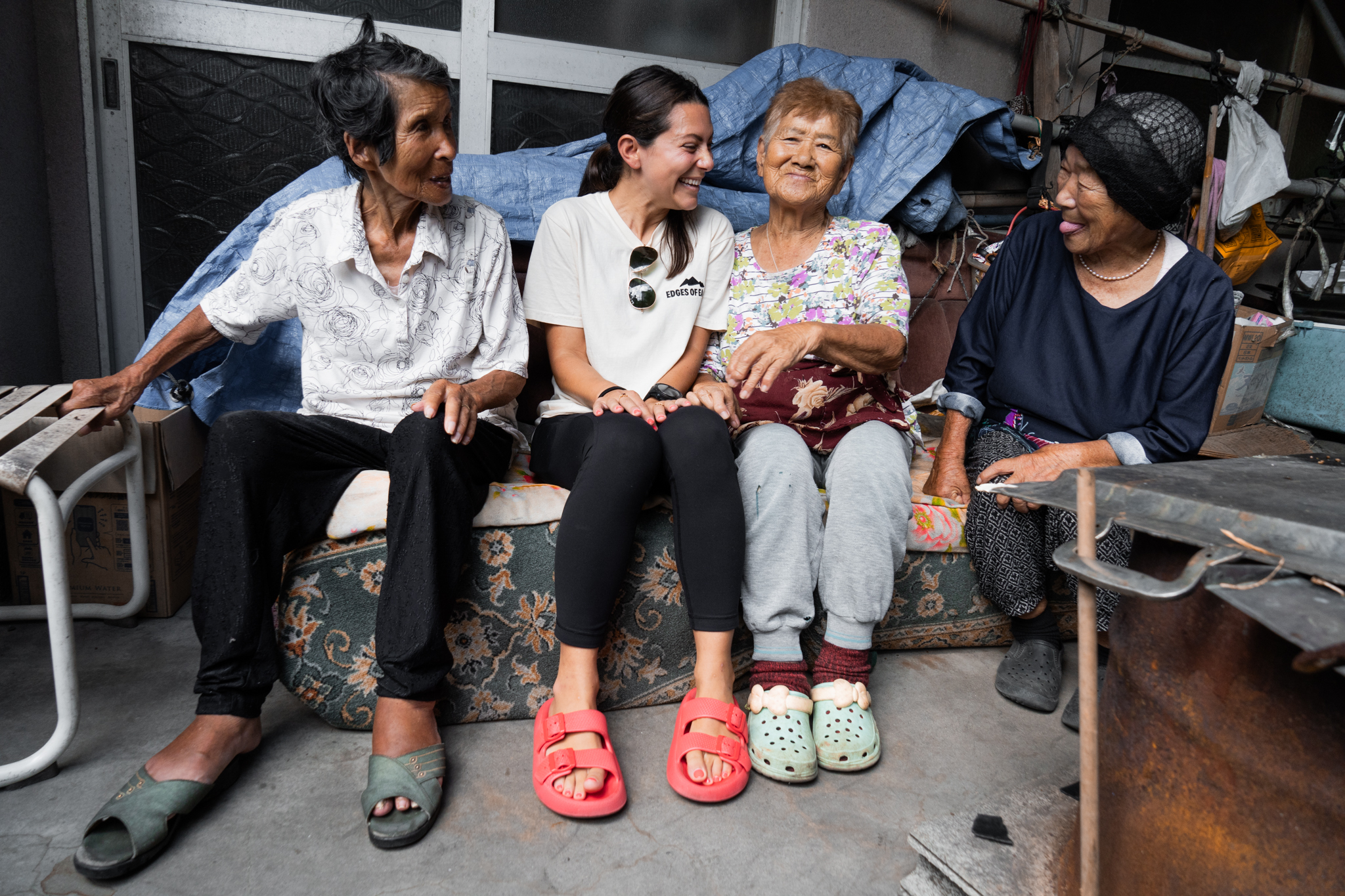 Andi Cross with Ama free divers in Japan, sharing stories and cultural exchange